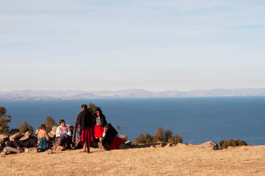 2-Day Amantani Island homestay overnight Tour from Puno - Uros: walking on islands made from totora reeds