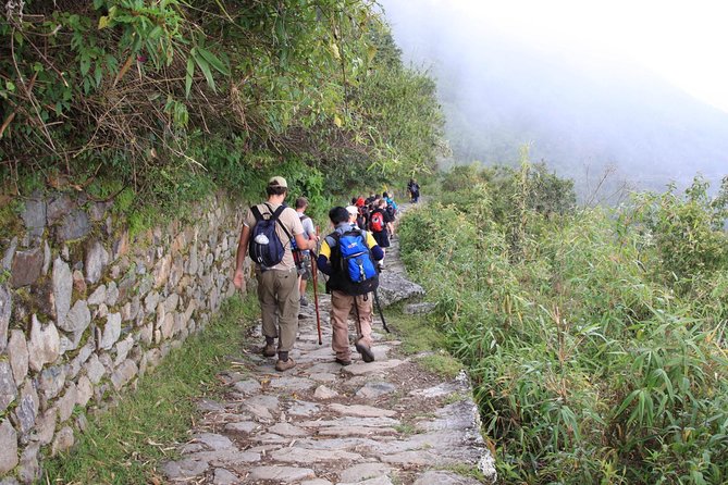2-Day Private Short Inca Trail to Machu Picchu - Lunch, trains, buses, and the return to Cusco