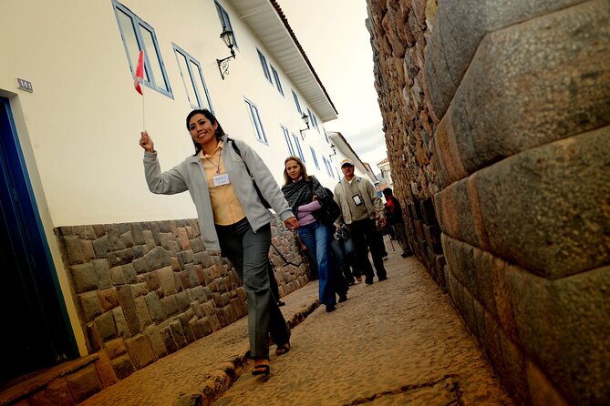 Cusco City Sightseeing and Sacsayhuaman Archeological Park Tour - Qorikancha and the collision of two faiths