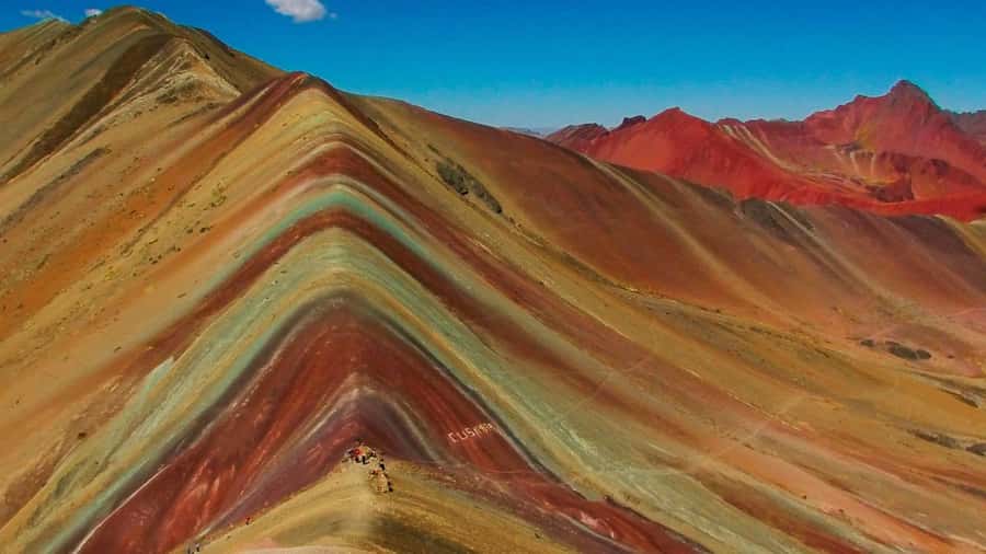 Cusco: Full-Day Rainbow Mountain & Red Valley Trekking Tour - The 1.5-hour climb to 5,036 meters