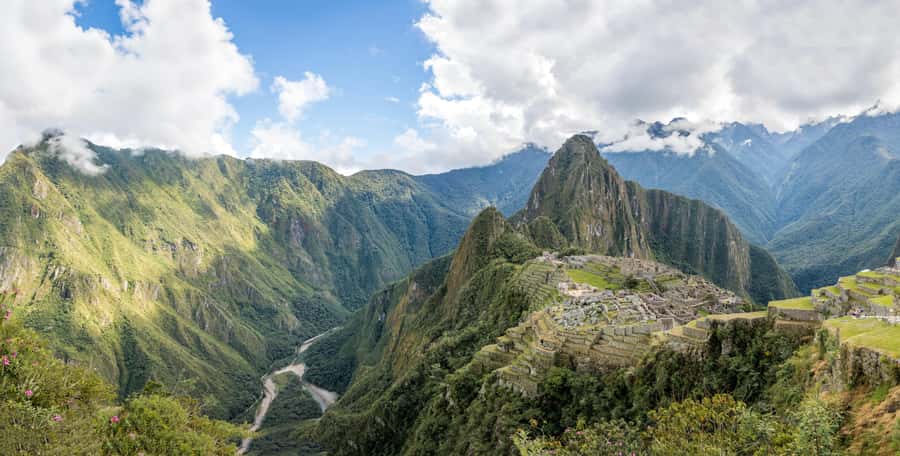 Machu Picchu on its ridge with Huayna Picchu behind it