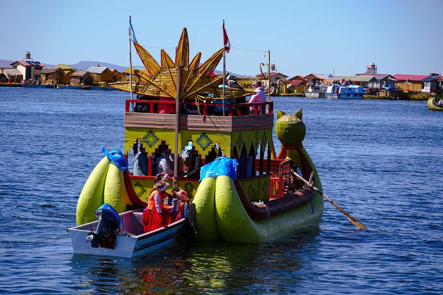 From Cusco: Titicaca Lake - Full day tour with sleeper bus - Taquile Island, markets, and a family lunch