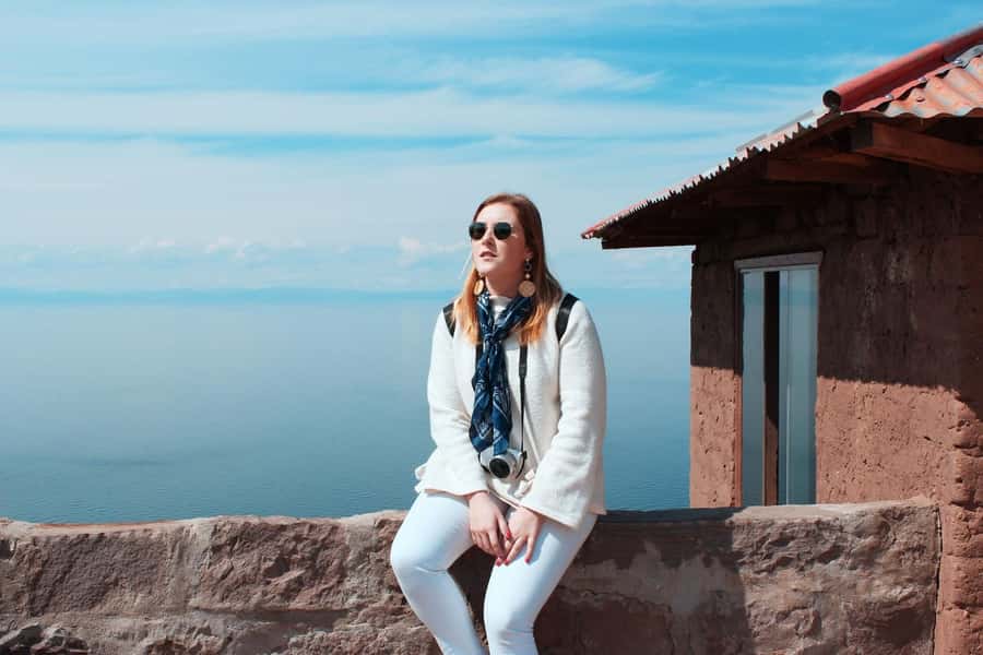From Cusco: Titicaca Lake - Full day tour with sleeper bus - Meeting a family on the Uros floating islands