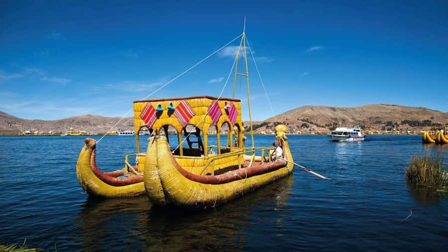 From Cusco: Uros Excursion to Uros Island - Taquile + Lunch. - Meeting the reed-built Uros Islands