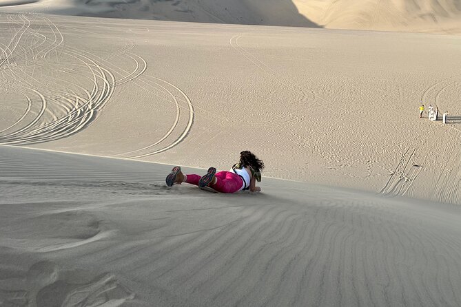 From Huacachina: Sunset buggy and sandboarding - Boarding the buggy near the oasis