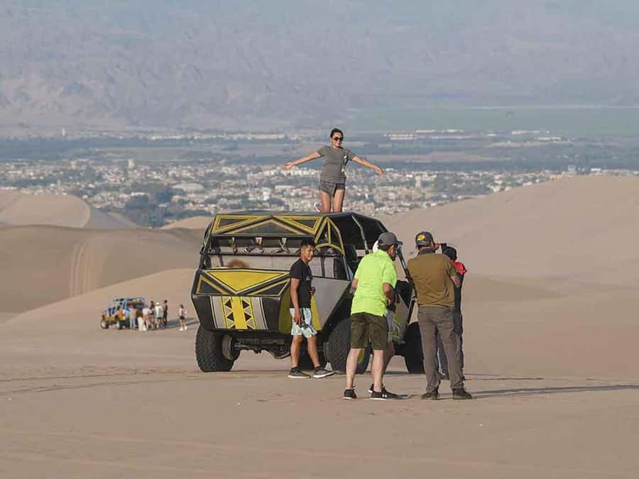 From Lima: Ballestas Islands and Huacachina Sunset Day Trip - Buggy rides and beginner sandboarding