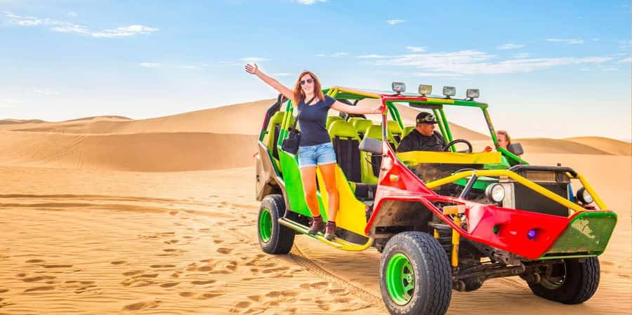 From Lima: Paracas and Huacachina Guided Desert Oasis Trip - Sandboarding from the desert dunes