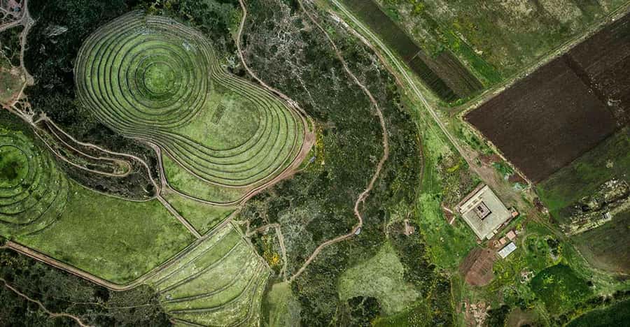 From Ollantaytambo: Moray, Maras, and Chinchero Guided Tour - Maras Salt Pools Still Do Working Business