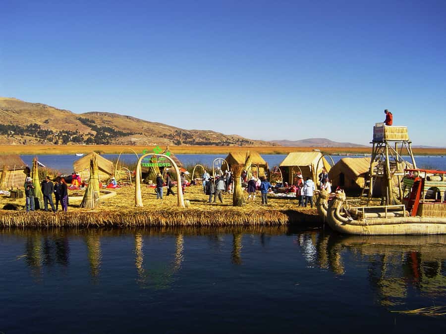 From Puno: Floating Islands of the Uros Half-Day Tour - Leaving Puno for the open water