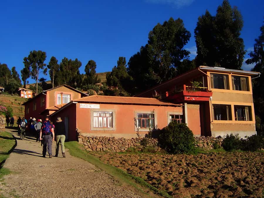From Puno: Uros, Amantaní & Taquile Islands 2-Day Tour - Taquile’s hats, textiles, and steep paths