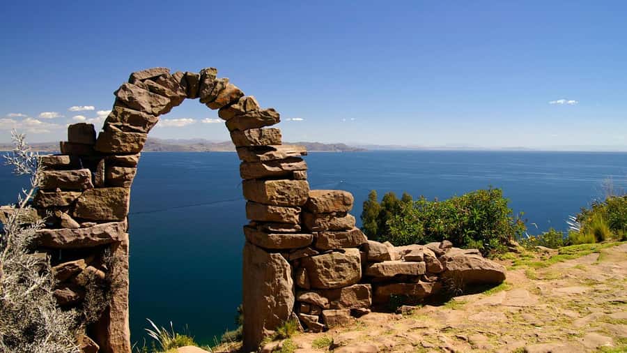 Lake Titicaca, Uros and Taquile Full-Day Tour - Taquile Island and its Quechua traditions