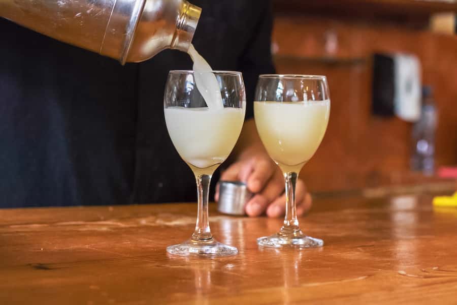 Lima: Lights, Pisco, and Fun Night Tour and Pisco Tasting - Pisco drinks, with realistic expectations