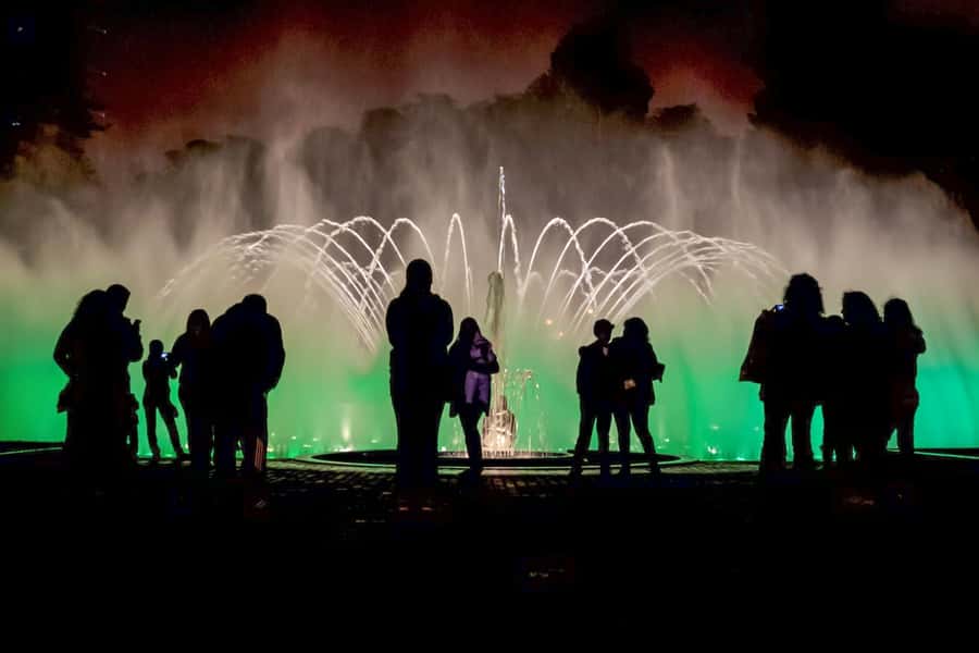 Lima: Water Magic Circuit, Downtown and Catacombs Night Tour - Walking Lima’s Main Square after dark