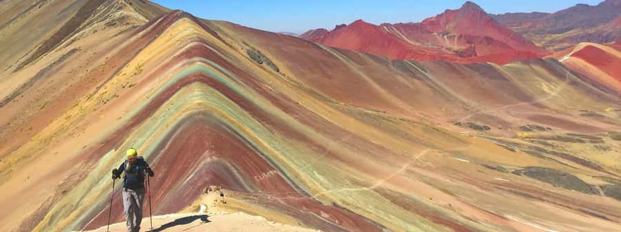 One day tour to Rainbow Mountain and Red Valley (optional) - What the guide adds to the day
