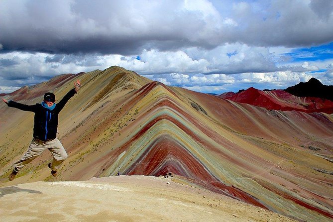 Private Rainbow Mountain Full Day Tour - Reaching the colorful summit