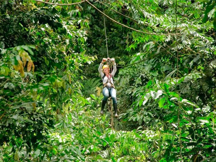 Puerto Maldonado: Jungle Adventure |Zipline + Canopy + Kayak - Crossing the suspension bridge in the canopy