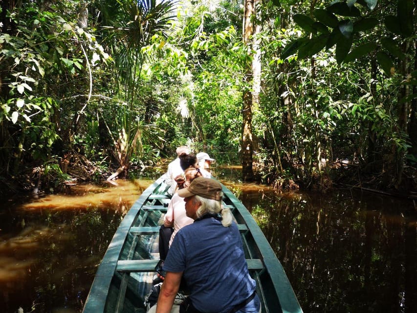 Puerto Maldonado: Lago Sandoval Day Trip with Lunch - Reaching Lago Sandoval by rowboat
