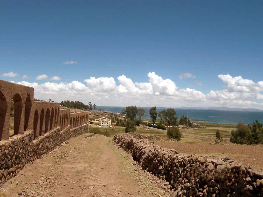 Puno: Chucuito, Aramu Muru, and Juli Day Trip - Transport, timing, and group size