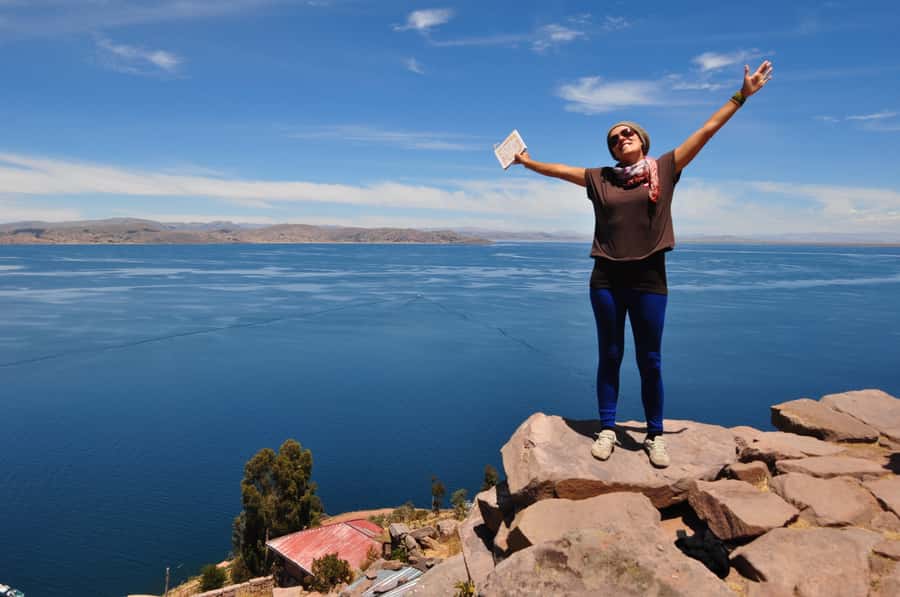 Puno: Lake Titicaca Day Tour - The covered 35-foot boat across the lake