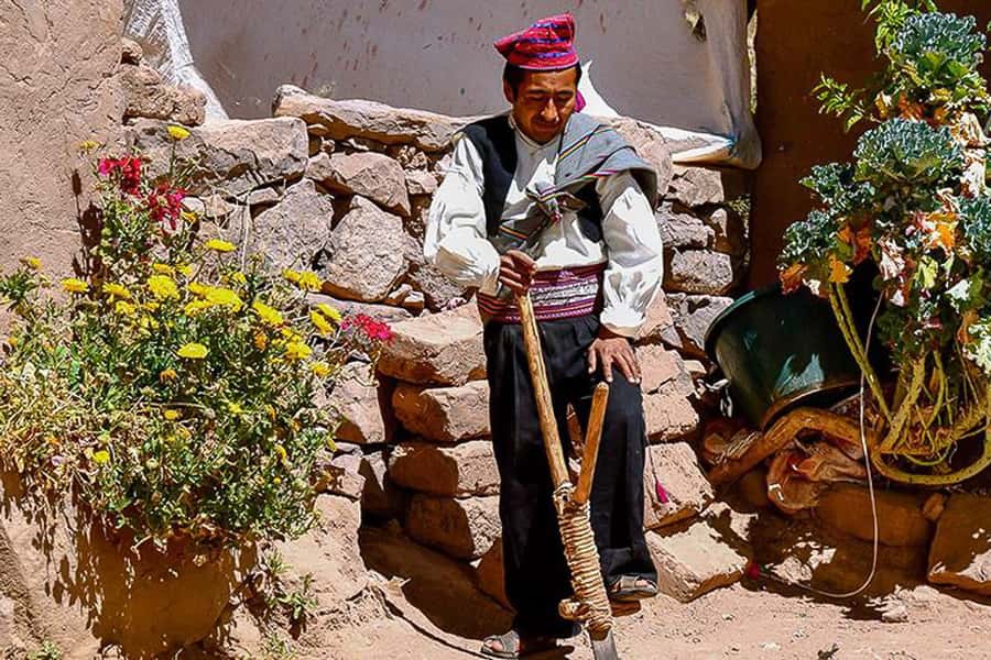 Puno: Lake Titicaca Day Tour - Walking across the Uros floating islands