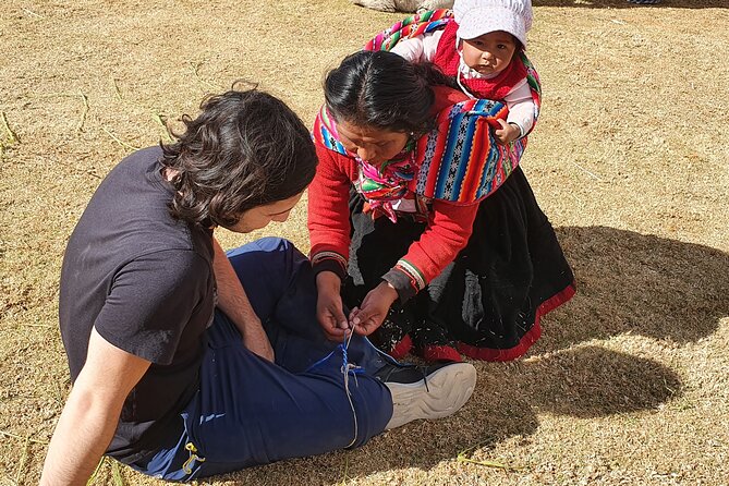 The Textile Workshop Experience in Cusco Region - Cleaning wool and learning where textiles begin