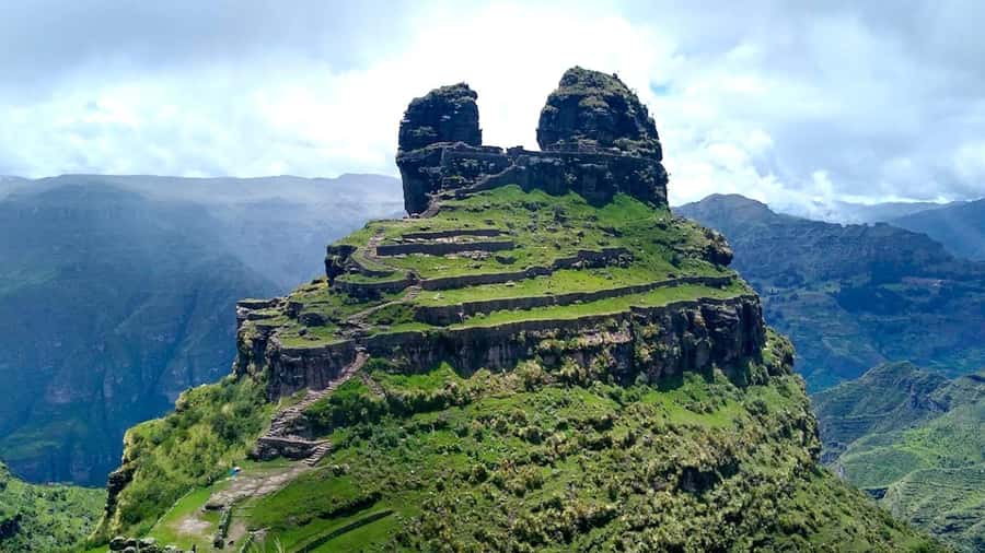 "Waqra Pucara, The Majestic Fortress Revealing Secrets of the Andes". - Pomacanchi Lagoon and the Andean countryside